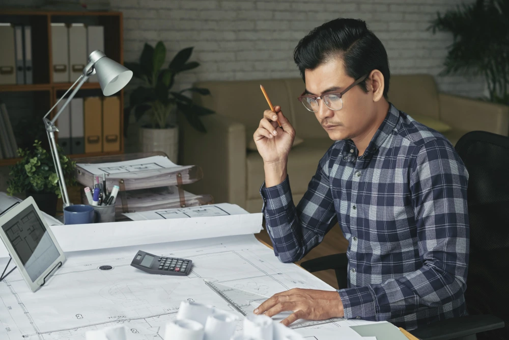 Construction estimator expert working on project