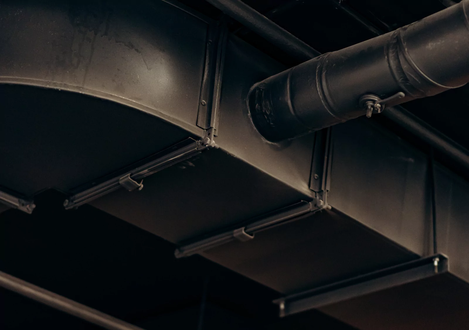 Industrial HVAC ductwork and mechanical systems installation for commercial building project estimation